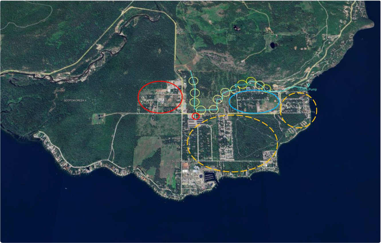 Satellite view of coastal town with highlighted areas