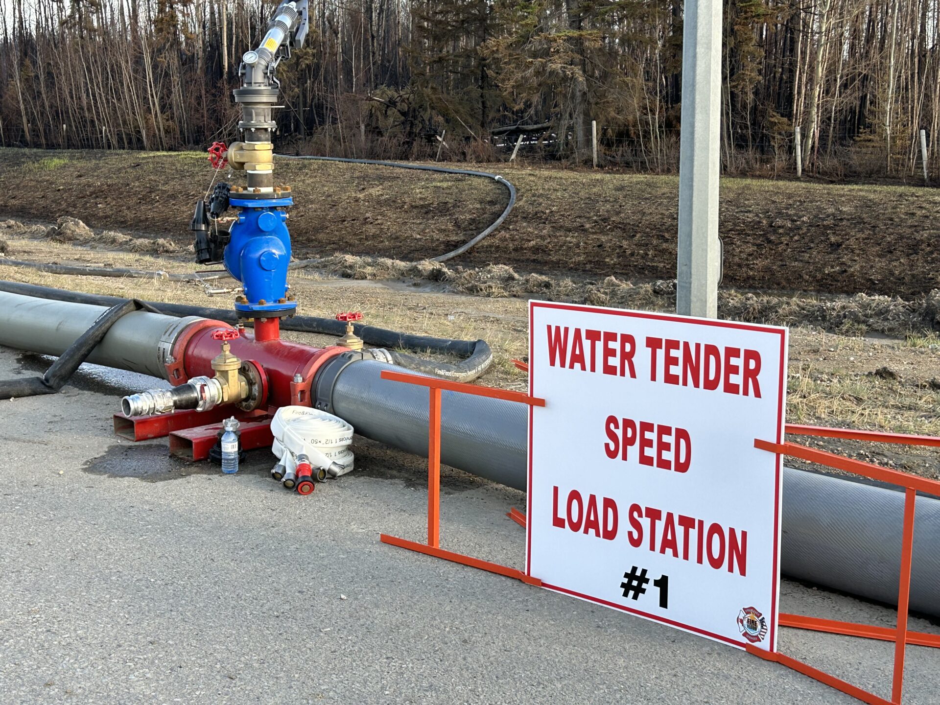 Water tender speed load station with large hoses